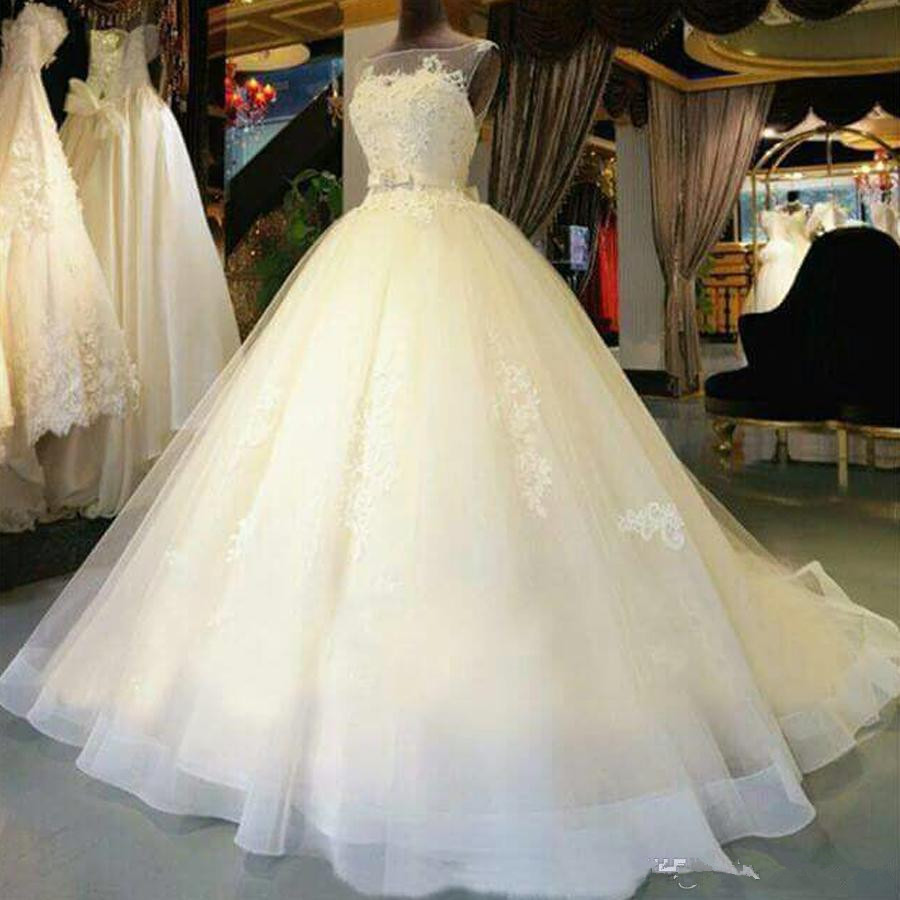 Image of Beautiful A-Line Gowns Sleeveless Tulle Wedding Dresses Illusion Neckline Appliques Elegnat Bridal Custom Made Court Train robe de soirÃ©e mariage