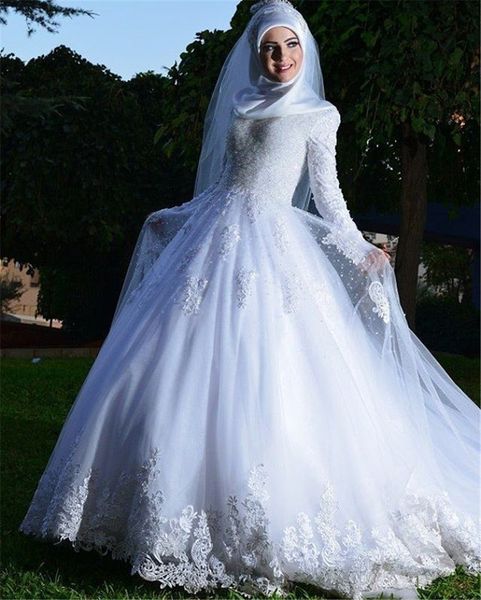 Image of ENM 399541609 long sleeve muslim white wedding dress with kerchief appliques elegant arabic a-line bridal gowns lace up