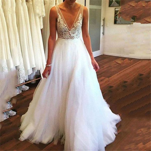 Image of ENM 670423593 zj9236 deep v neck boho wedding dresses 2021 country lace appliqued lace-up bridal gown floor-length plus size