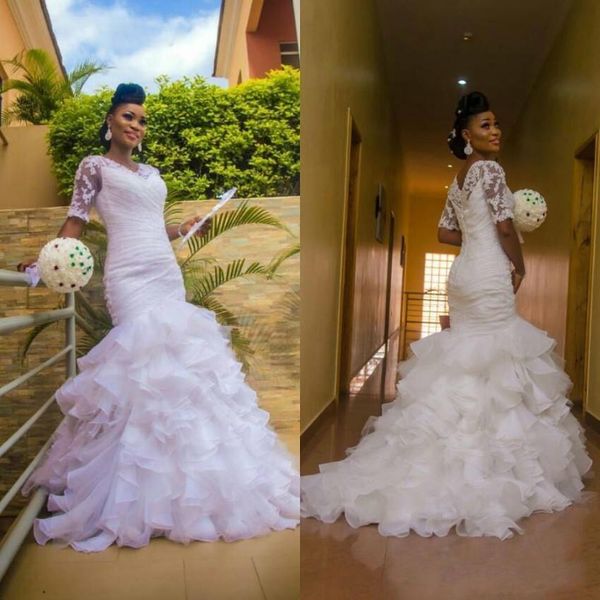 Image of ENM 671519234 elegant african white mermaid wedding dresses 2021 appliques lace tiered skirt half sleeve long bridal gowns robe de mariee