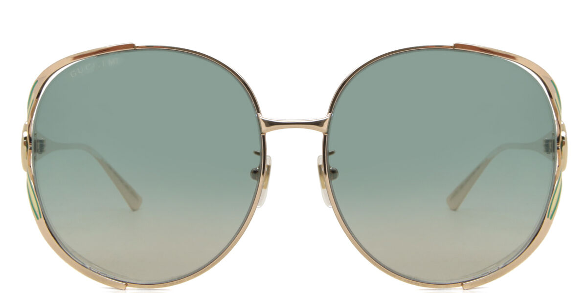 Image of Gucci GG0225S 006 63 Lunettes De Soleil Femme Dorées FR