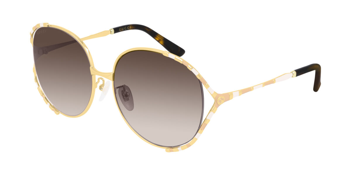 Image of Gucci GG0595S 004 59 Lunettes De Soleil Femme Dorées FR