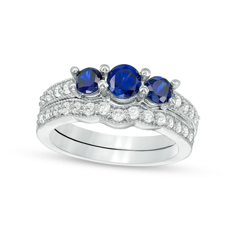 Image of ID 1 45mm Lab-Created Blue and White Sapphire Three Stone Bridal Engagement Ring Set in Sterling Silver