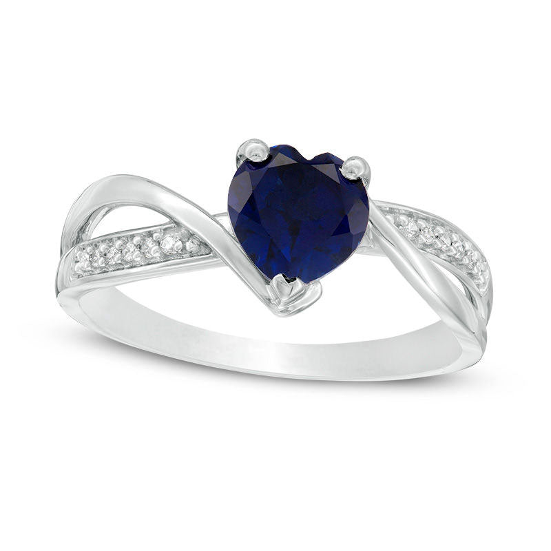 Image of ID 1 60mm Heart-Shaped Lab-Created Blue Sapphire and 005 CT TW Diamond Crossover Bypass Promise Ring in Sterling Silver