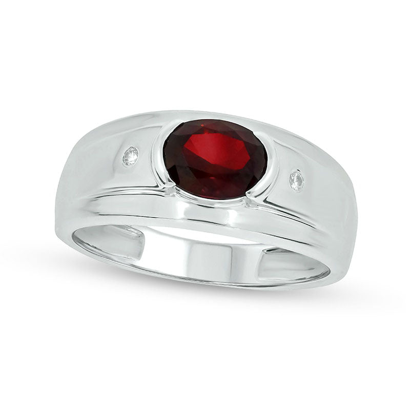 Image of ID 1 Men's Sideways Oval Lab-Created Ruby and Diamond Accent Bevelled Edge Ring in Sterling Silver