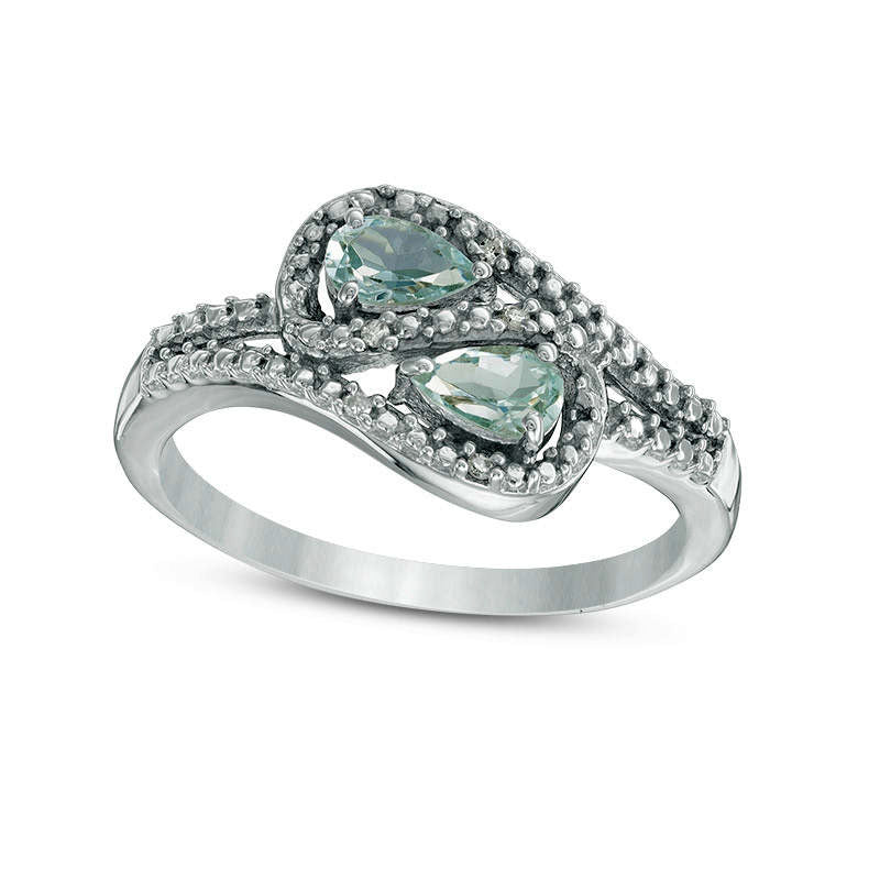 Image of ID 1 Oval Aquamarine and Natural Diamond Accent Bypass Loop Ring in Solid 10K White Gold