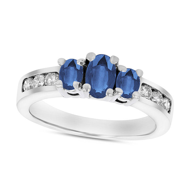 Image of ID 1 Oval Blue Sapphire and 033 CT TW Natural Diamond Channel Three Stone Engagement Ring in Solid 14K White Gold