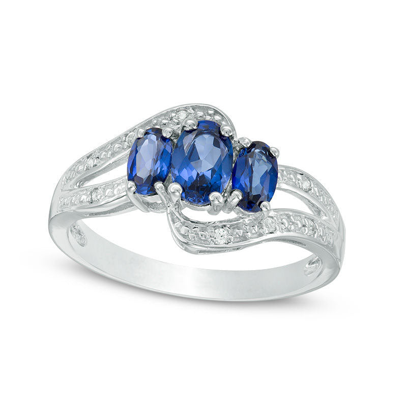 Image of ID 1 Oval Lab-Created Blue and White Sapphire Three Stone Bypass Ring in Sterling Silver
