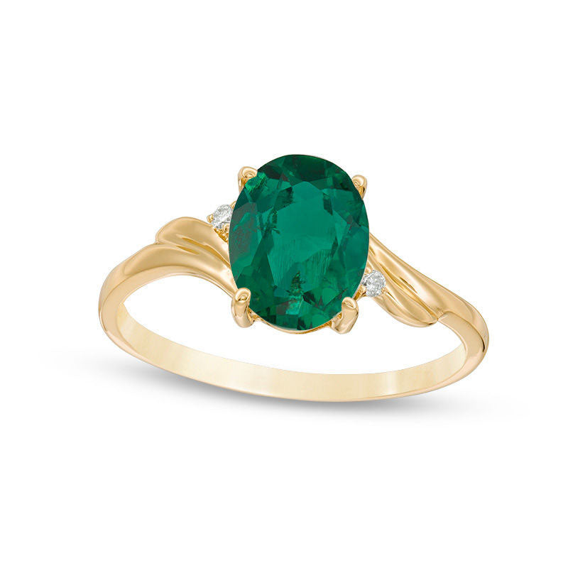 Image of ID 1 Oval Lab-Created Emerald and Diamond Accent Bypass Swirl Shank Ring in Solid 10K Yellow Gold