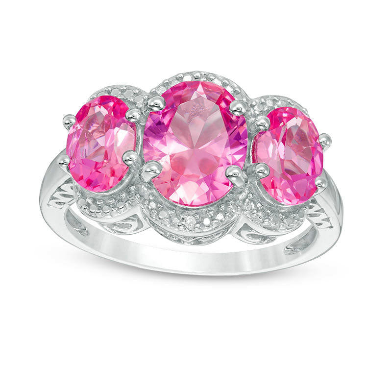 Image of ID 1 Oval Lab-Created Pink Sapphire and Diamond Accent Three Stone Frame Ring in Sterling Silver