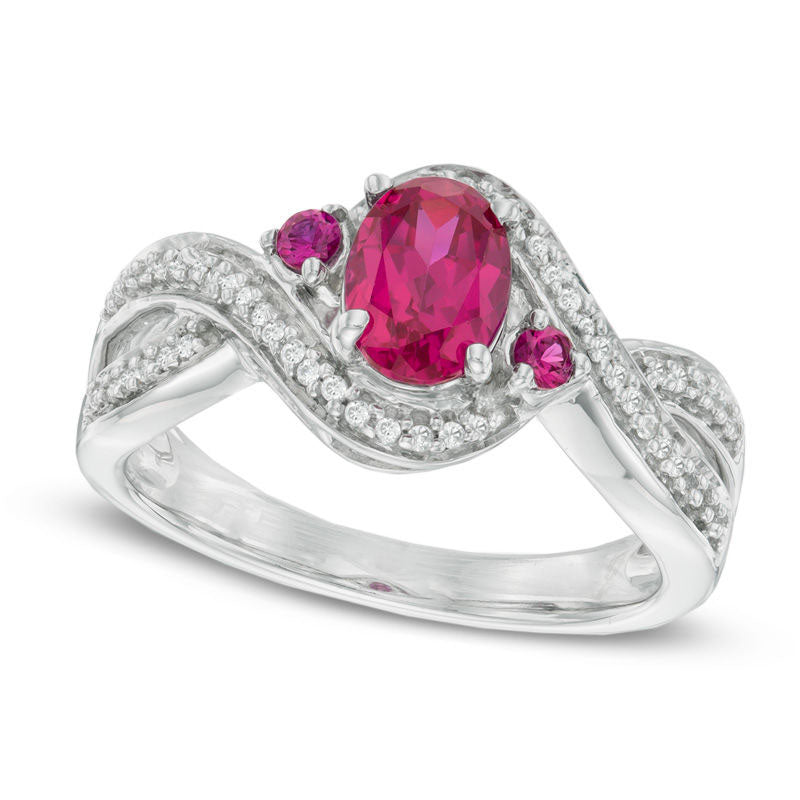 Image of ID 1 Oval Lab-Created Ruby and 017 CT TW Diamond Swirl Ring in Sterling Silver