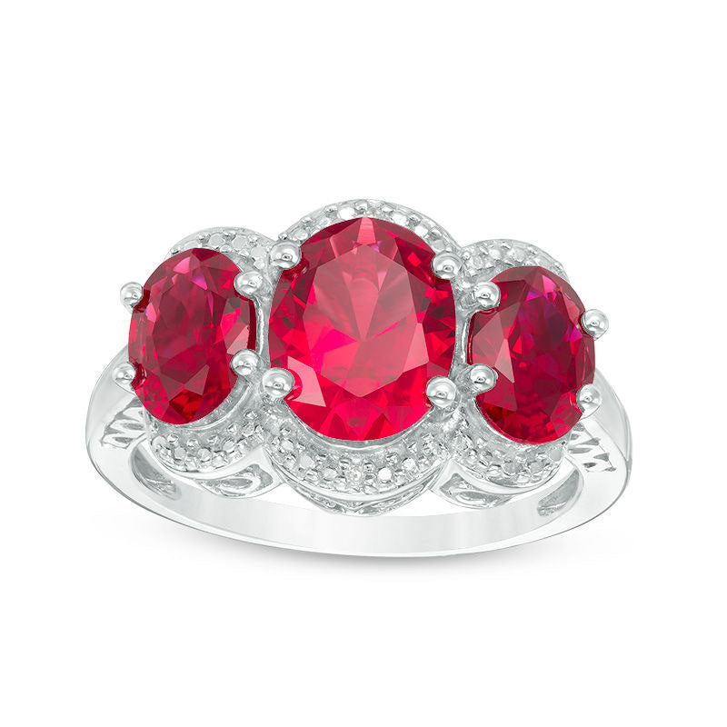 Image of ID 1 Oval Lab-Created Ruby and Diamond Accent Three Stone Frame Ring in Sterling Silver