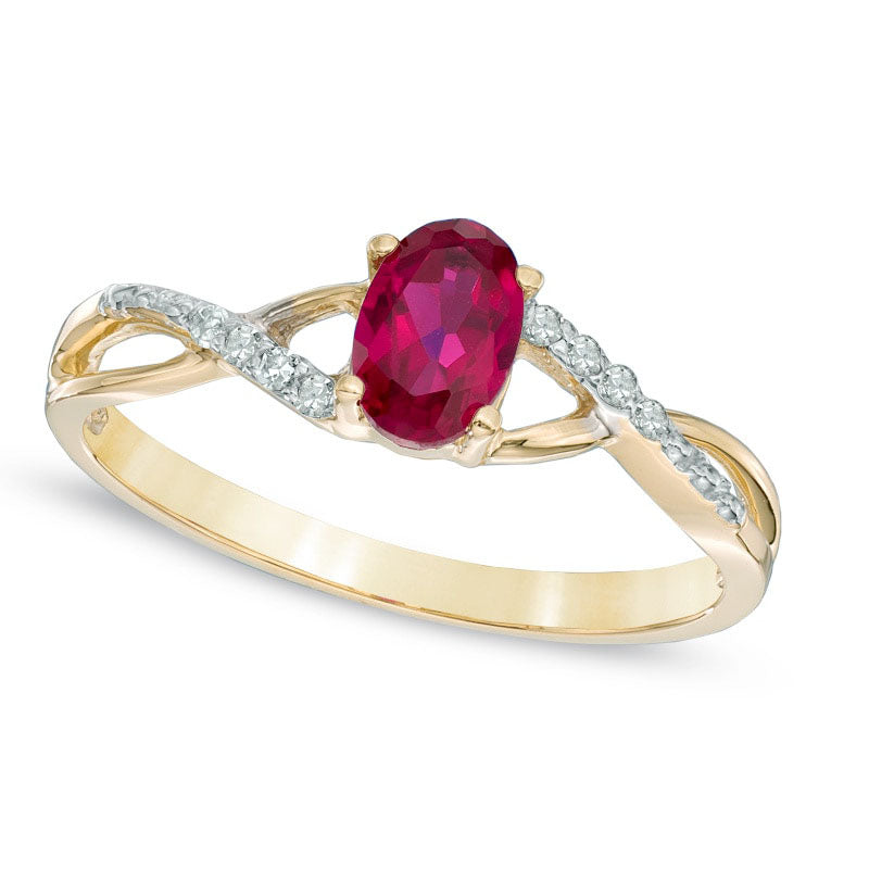 Image of ID 1 Oval Lab-Created Ruby and Diamond Accent Twist Engagement Ring in Solid 10K Yellow Gold