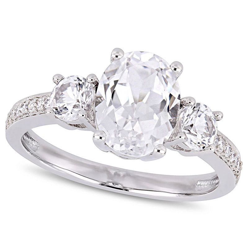 Image of ID 1 Oval Lab-Created White Sapphire and 007 CT TW Diamond Three Stone Engagement Ring in Solid 10K White Gold