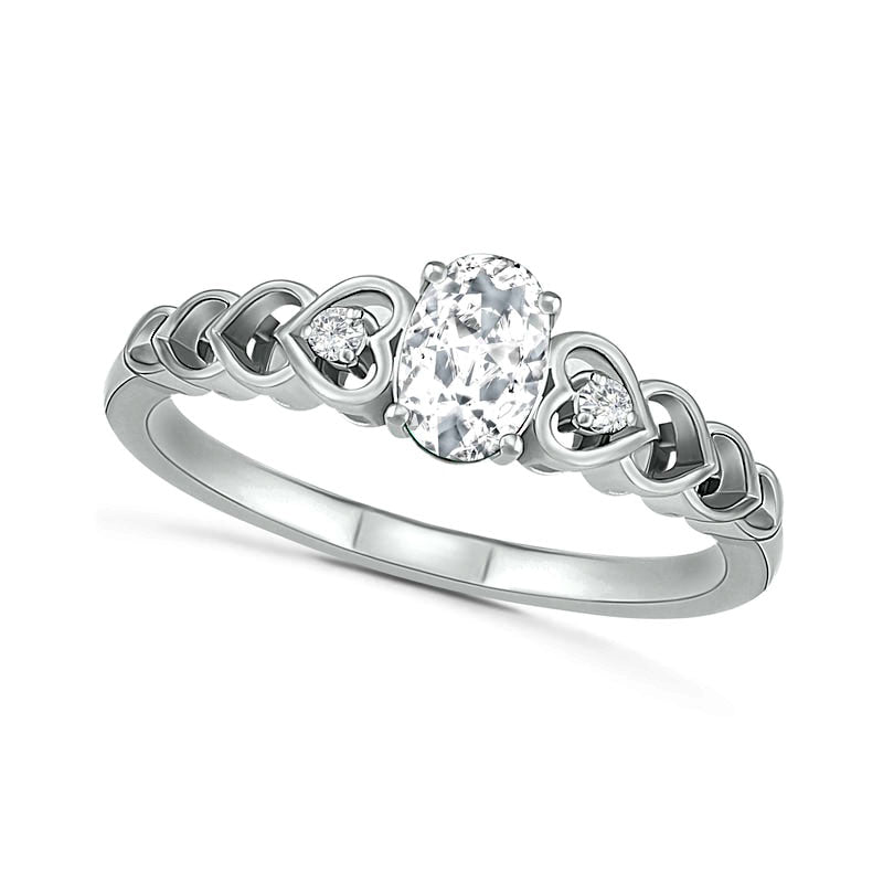 Image of ID 1 Oval Lab-Created White Sapphire and Diamond Accent Heart-Sides Trio Ring in Sterling Silver
