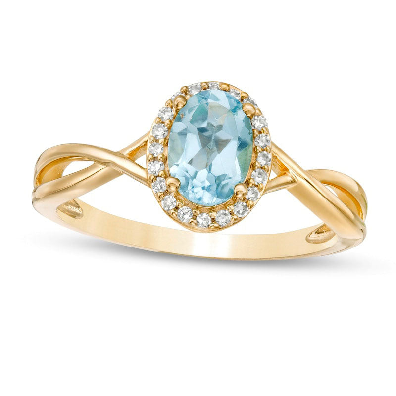 Image of ID 1 Oval Swiss Blue Topaz and 007 CT TW Natural Diamond Frame Twist Shank Ring in Solid 10K Yellow Gold