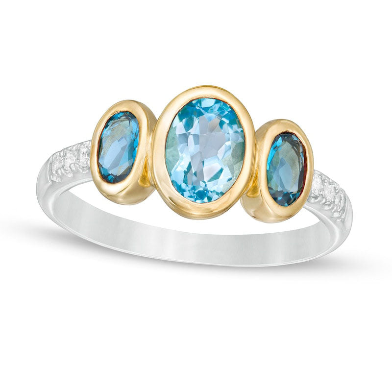 Image of ID 1 Oval Swiss and London Blue and White Topaz Three Stone Ring in Sterling Silver and Solid 14K Gold Plate
