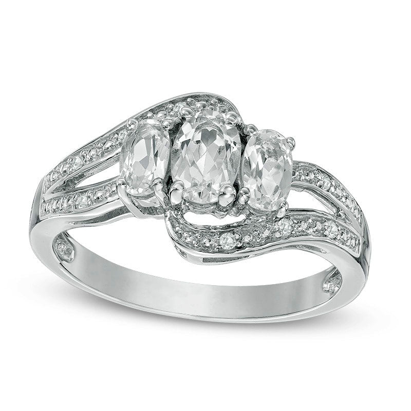 Image of ID 1 Oval White Topaz Three Stone Bypass Ring in Sterling Silver