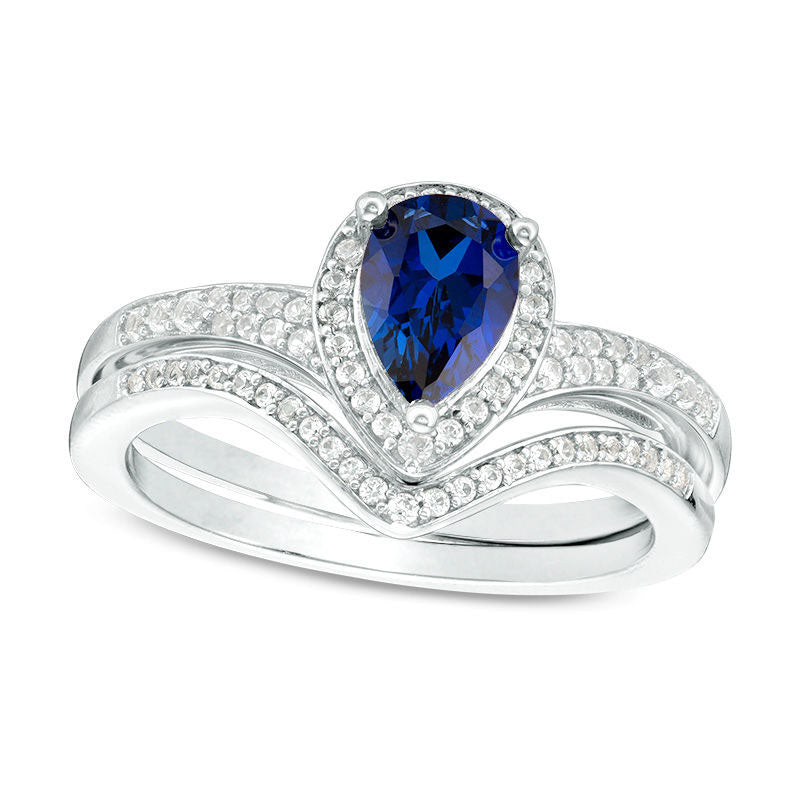 Image of ID 1 Pear-Shaped Lab-Created Blue Sapphire and 025 CT TW Diamond Frame Chevron Bridal Engagement Ring Set in Sterling Silver